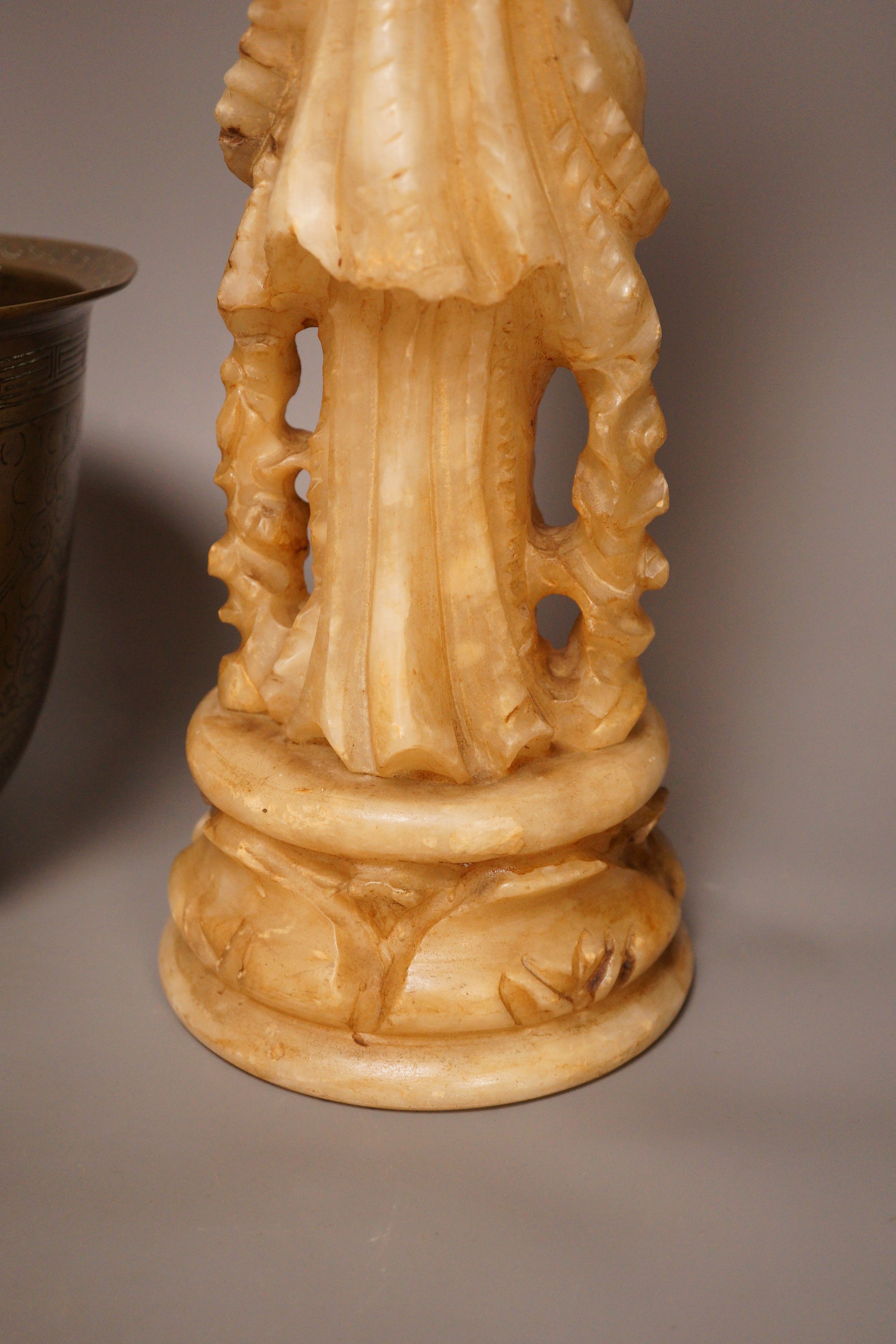 A Chinese bronze 'dragon' bowl, early 20th century and a large Chinese soapstone figure of Shou Lao, 28cm tall